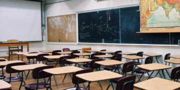 Empty elementary classroom during recess.