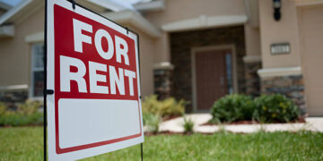 For Rent sign in front of new house