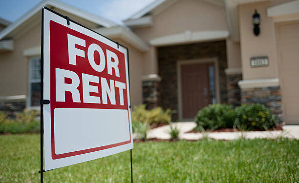 For Rent sign in front of new house