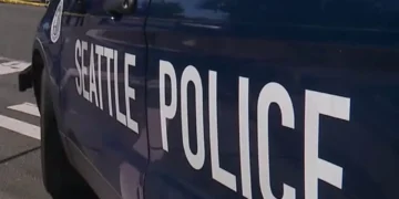 Seattle Police Officer Injured After Collision with Metro Bus in SODO