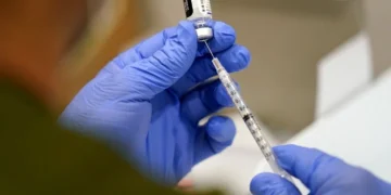 FDA Restricts COVID-19 Boosters for Younger Adults Without High-Risk Conditions